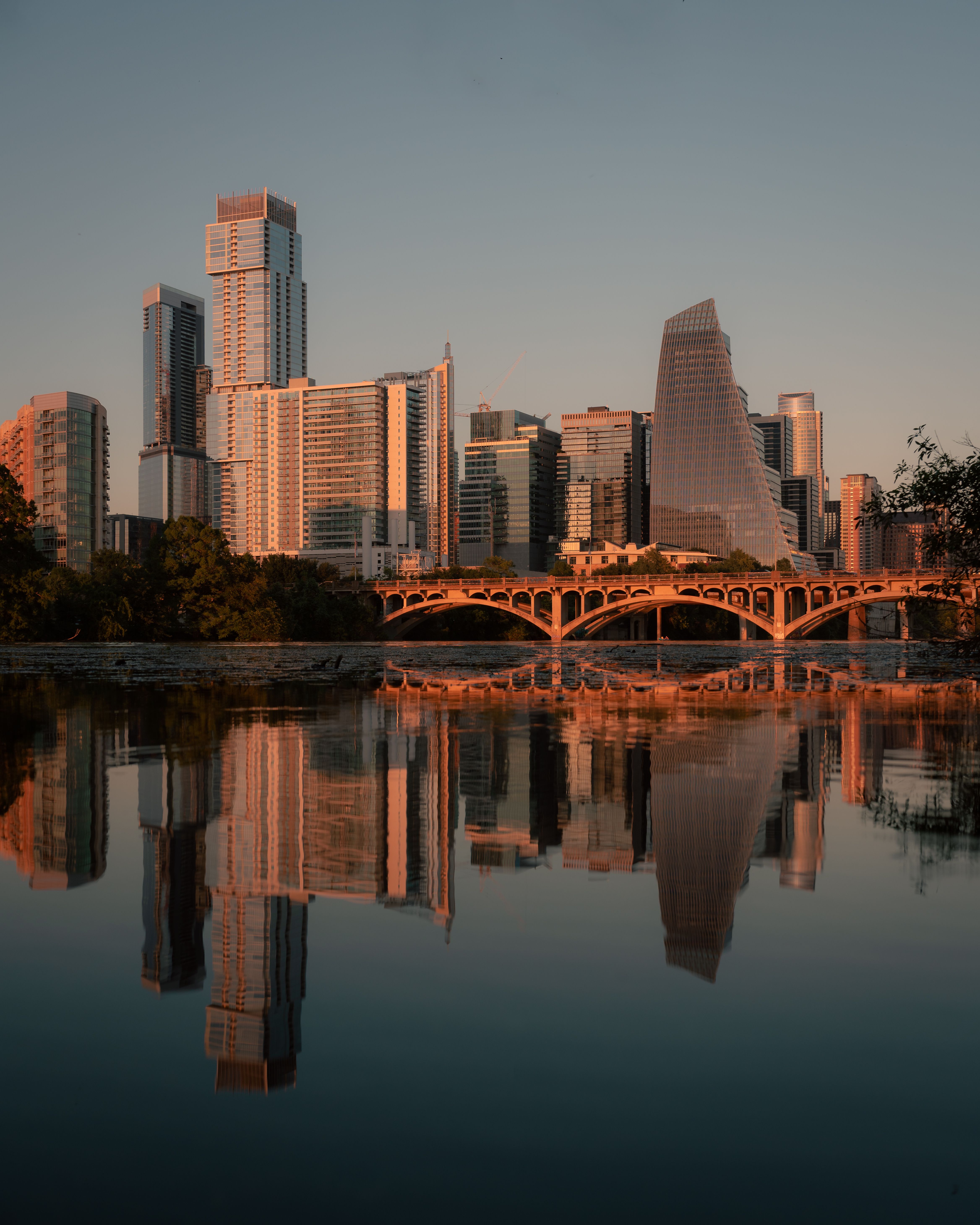 Downtown Austin, Texas skyline reflected in Lady Bird Lake at sunset
